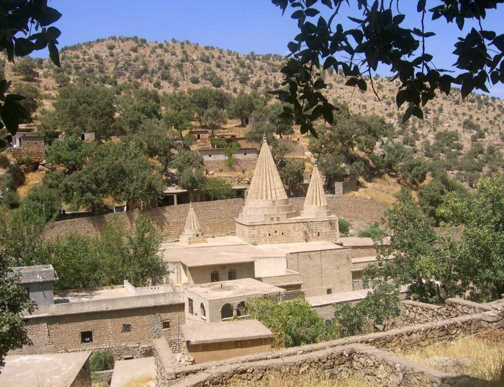 Conical roofs chracteristic of Yazidi sites mark the tomb of Şx Ad in Lalesh.