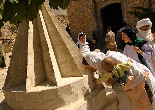 Yezidi pilgrims. During the Yazidi summer feast festival, 15,000 people typically make the pilgrimage to Lalish.