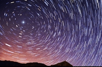The Yezidi name for the Pole Star is <i>al-Qud</i>. The sanjak represents this same rotating sky-pole or <i>axis mundi</i> and is equated to Taus Melek, the peerless Peacock Angel.